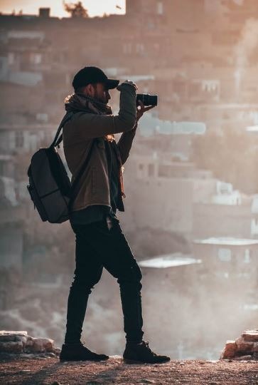 J. David Ake, inspires neophyte photojournalists.